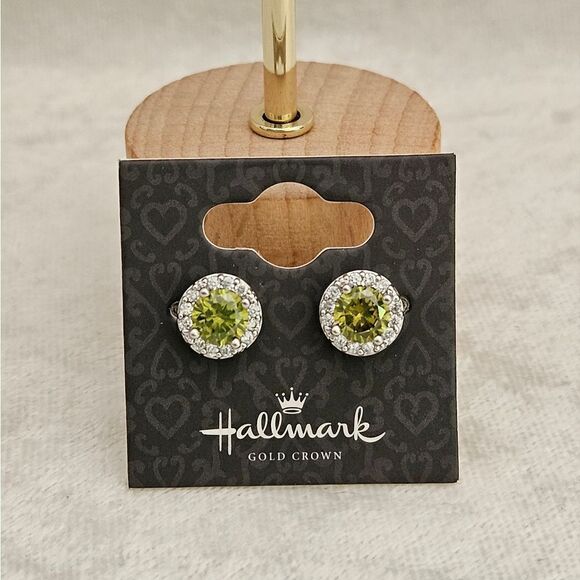 Hallmark stud earrings in Peridot color and stainless steel. - Picture 2 of 3
